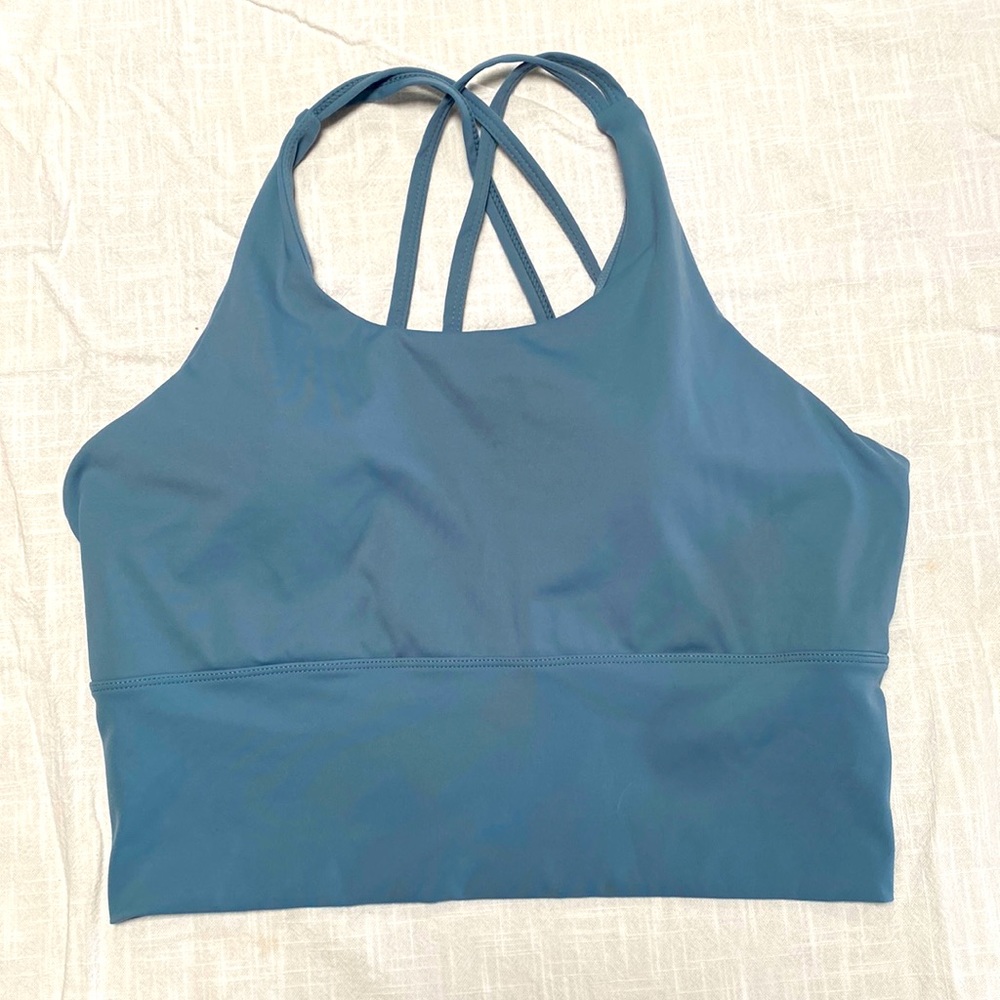 Slate blue. Size large cute sports bra. Gently used. No brand. Wear as swim top